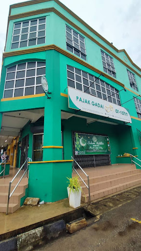 Ar-Rahn Tanah Merah